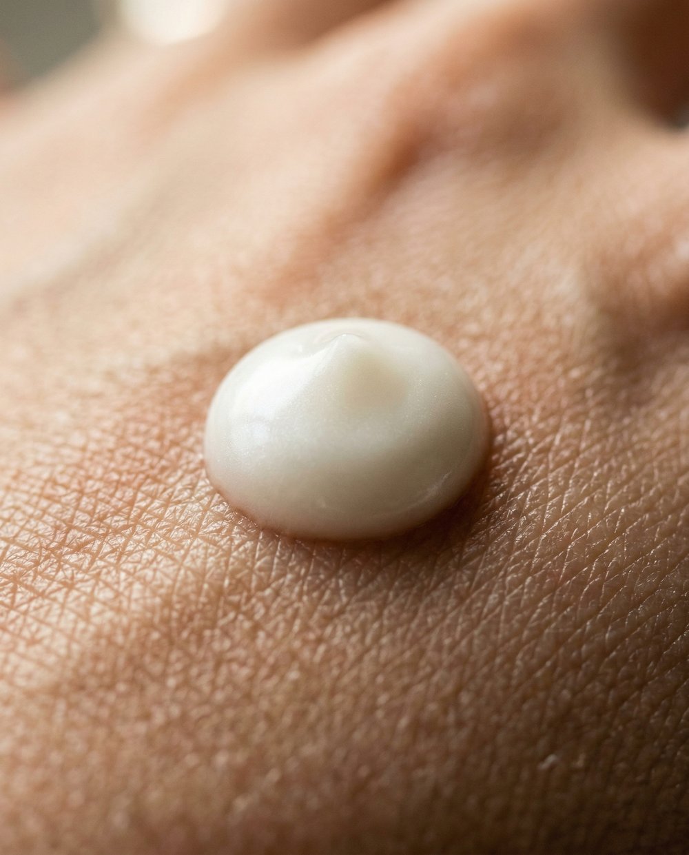 Cross-section illustration of skin layers showing serum absorption